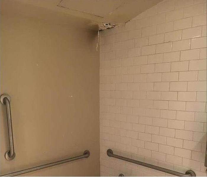 commercial bathroom ceiling damage